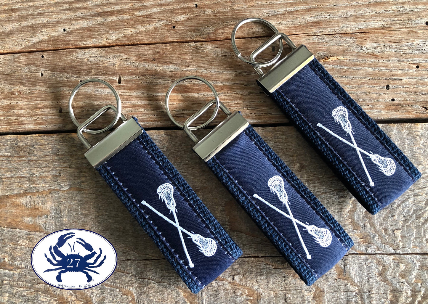 White Lacrosse Sticks on Navy Key Chain