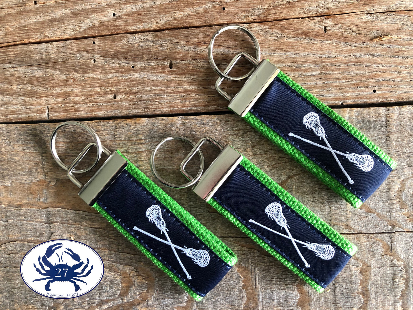 White Lacrosse Sticks on Navy Key Chain