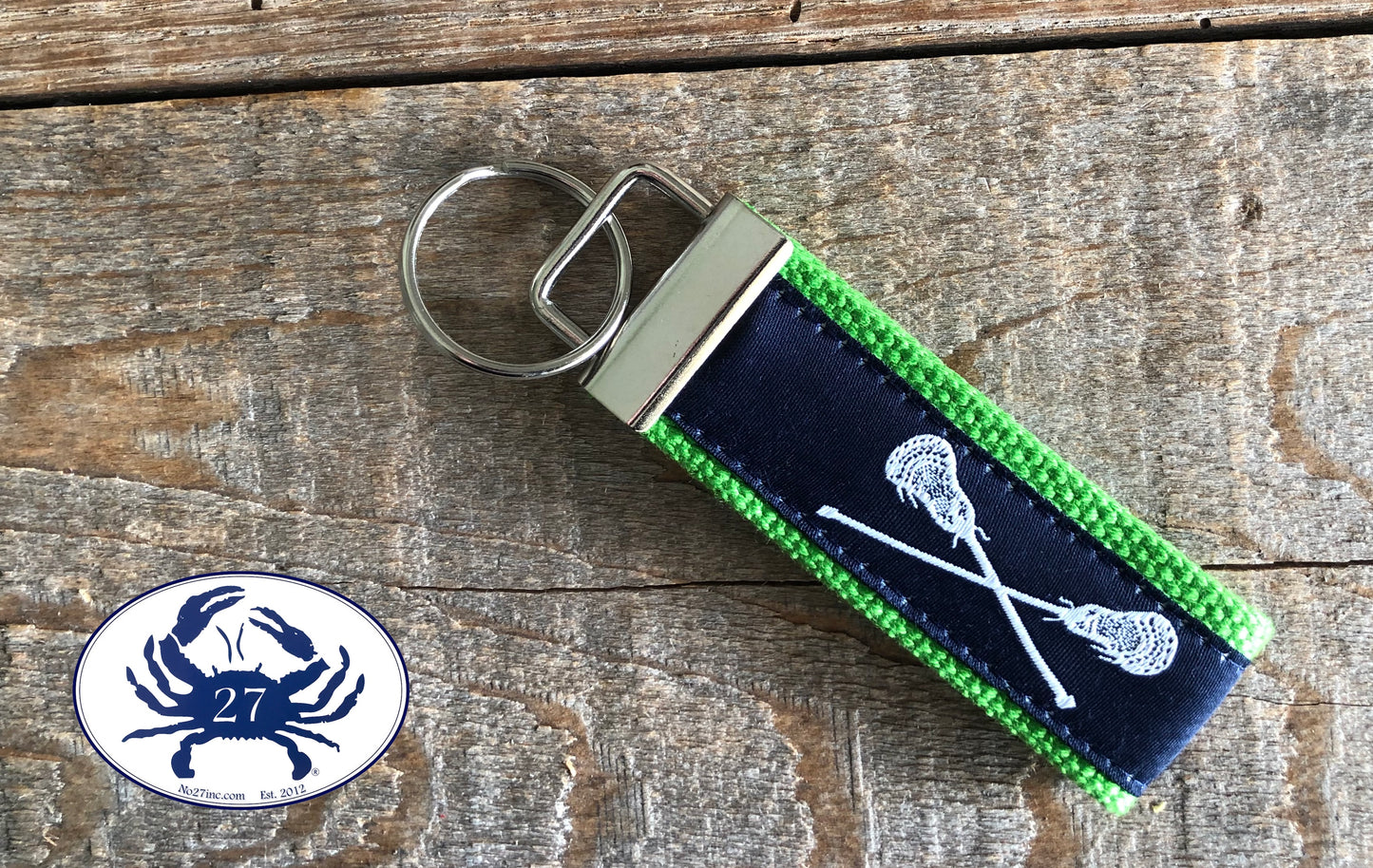 White Lacrosse Sticks on Navy Key Chain
