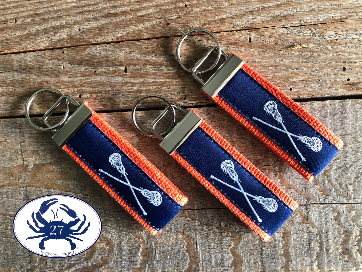 White Lacrosse Sticks on Navy Key Chain