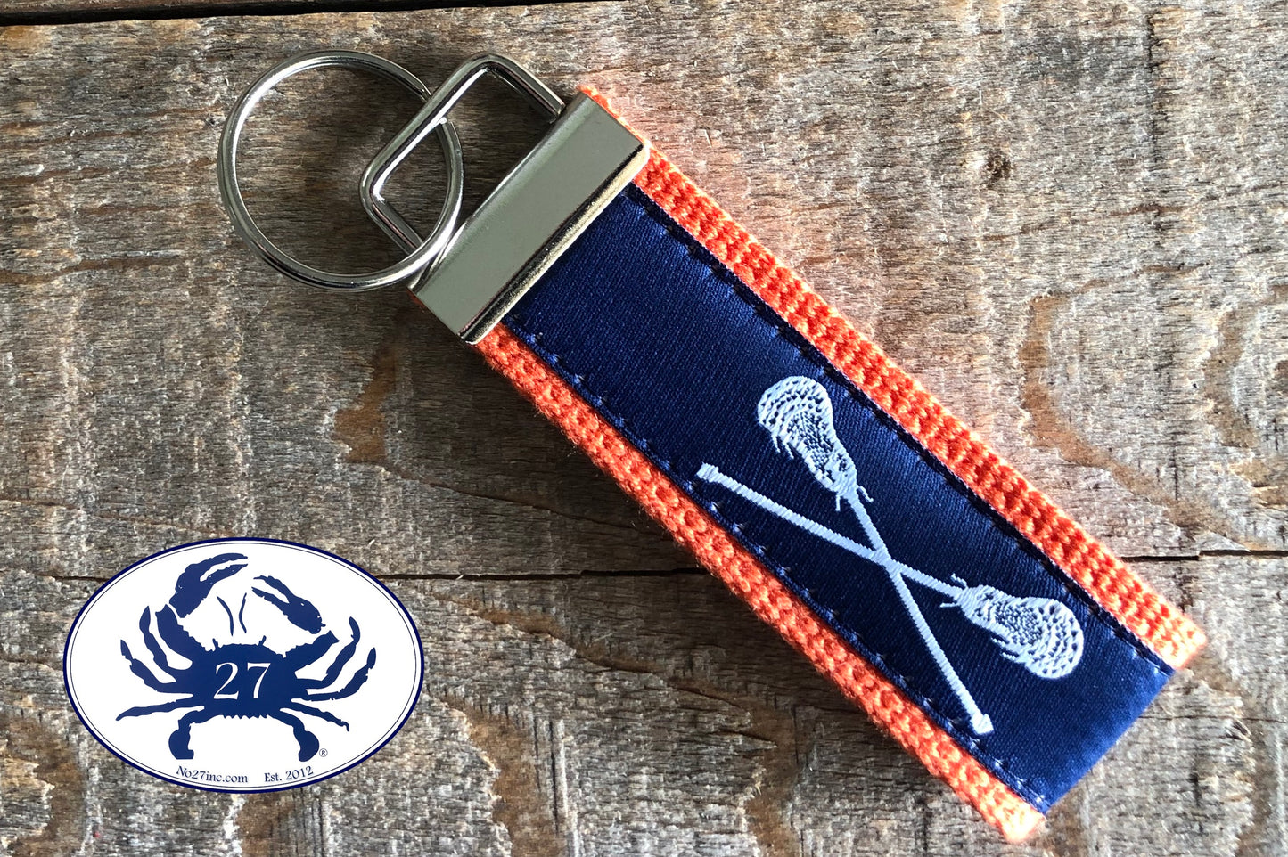 White Lacrosse Sticks on Navy Key Chain