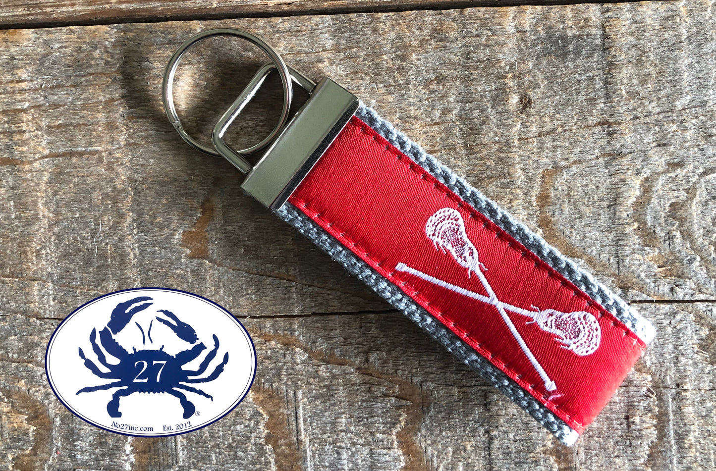 White Lacrosse Sticks on Red Key Chain