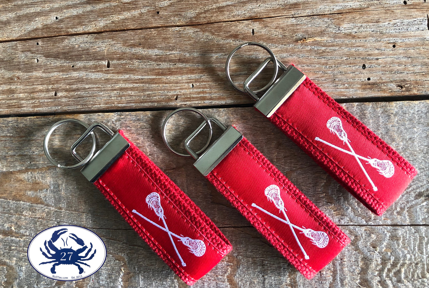 White Lacrosse Sticks on Red Key Chain