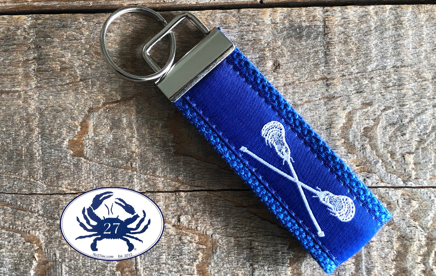 White Lacrosse Sticks on Royal Blue Key Chain