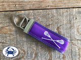 White Lacrosse Sticks on Purple Key Chain