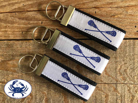 Royal Blue Lacrosse Sticks on White Key Chain