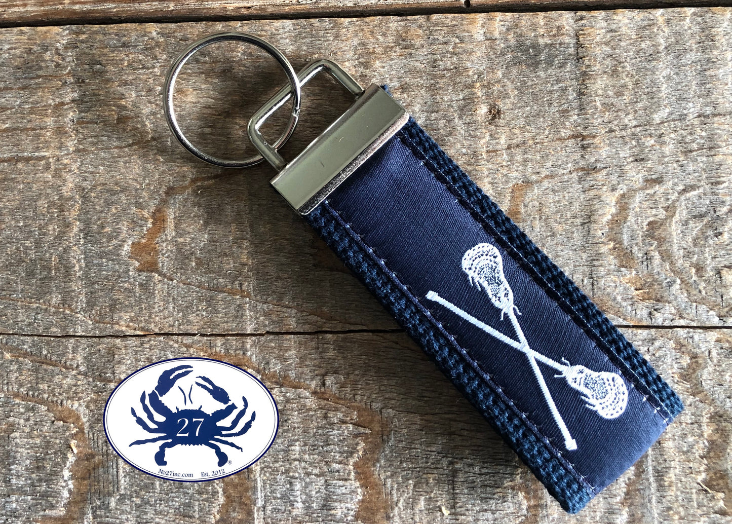White Lacrosse Sticks on Navy Key Chain