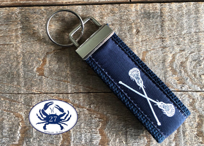 White Lacrosse Sticks on Navy Key Chain