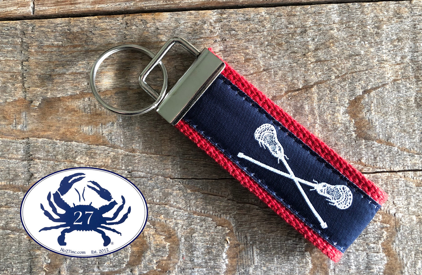 White Lacrosse Sticks on Navy Key Chain