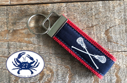 White Lacrosse Sticks on Navy Key Chain