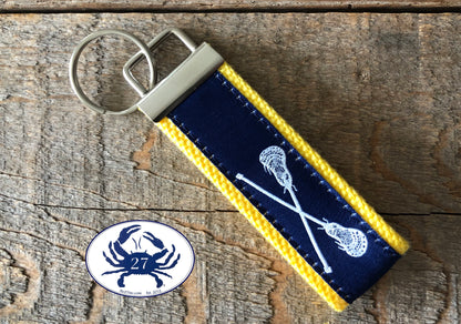 White Lacrosse Sticks on Navy Key Chain