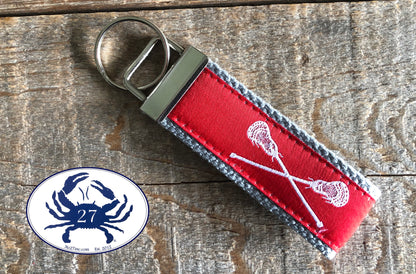 White Lacrosse Sticks on Red Key Chain