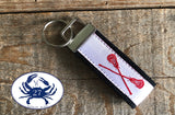 Red Lacrosse Sticks on White Key Chain